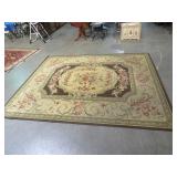 BEIGE AND BROWN AREA RUG 115" L X  92" W