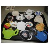 COLLECTION OF TEA BAG HOLDERS