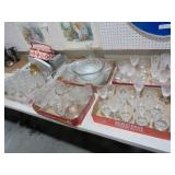 TABLE FULL OF CRYSTAL & CLEAR GLASSWARE & MISC