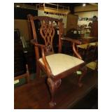 CARVED MAHOGANY CLAW FOOTED CHILDS PADDED ARMCHAIR