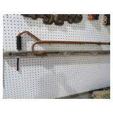 COLLECTION OF WALKING CANES & EARLY WOOD LEVEL