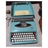 VINTAGE AQUA SMITH-CARONA TYPEWRITER