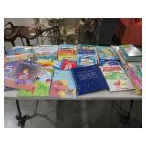 TABLE FULL OF CHILDRENS BOOKS