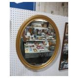 GOLD OVAL SHAPED WALL MIRROR