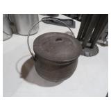SMALL CAST IRON THREE FOOTED POT WITH LID