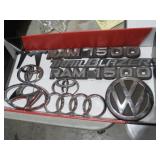 BOX OF VINTAGE CAR EMBLEMS