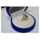 1.2 GR 10K GOLD GARNET RING SIZE 3.5