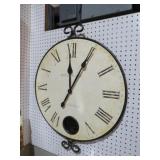 HOWARD MILLER METAL FRAMED WALL CLOCK