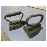 2 CAST IRON SADD IRONS