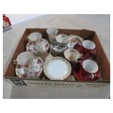 HAND PAINTED TEACUPS AND SAUCERS
