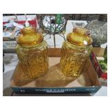 2 AMBER GLASS CANISTERS