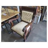 ANTIQUE CLAW FOOTED ROCKER WITH PADDED SEAT