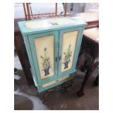 PAINTED TWO DOOR WOOD CABINET ON METAL STAND