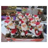 COLLECTION OF RESIN SANTA FIGURES