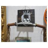 WOOD SKULL SIGN WITH HANDLEBARS