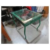 PAINTED CAST IRON TABLE WITH GLASS TOP