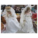 PAIR OF PORCELAIN DOLLS