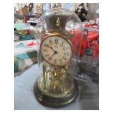 VINTAGE BRASS WITH GLASS GLOBE ANNIVERSARY CLOCK