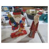(2) CARVED WOOD FOLK ART SANTAS