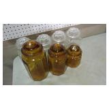SET OF 7 APOTHECARY JARS W/LIDS, AMBER & CLEAR