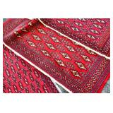 THREE SMALL RED WOOL CARPETS