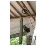 Antique well bucket with chain and pulley
