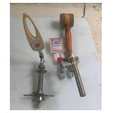 Antique beer taps 

One is a lucky lager and a
