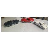 Three corvette die cast cars