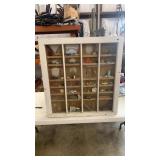Old window shadow box full of old toy cars and