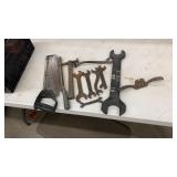 Tool lot
Has wrenches saws and a drawknife