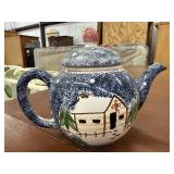 Small porcelain tea pot with winter scene. Made