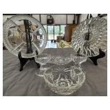 6 assorted glass serving dishes .