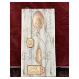 Decorative wooden wall sign with a vintage-style