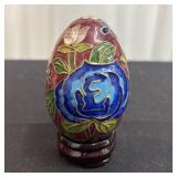 Cloisonnï¿½ enameled decorative egg with a wooden