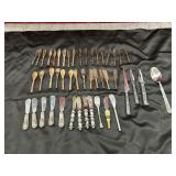 47 pc. Cheese ball spreaders and knives .
