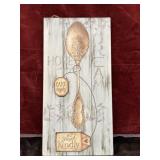 Decorative wooden wall sign with a vintage-style