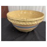 This is a vintage McCoy yellow ware mixing bowl