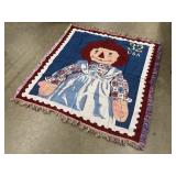 tapestry throw blanket featuring a Raggedy Ann