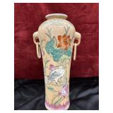 vintage Chinese porcelain vase features a