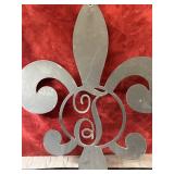 decorative metal wall hanging featuring a
