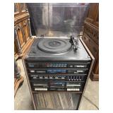 Sanyo music system in a cabinet with a turntable,