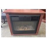 Heat Surge electric fireplace works