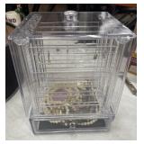 Dress up costume jewelry with storage racks and