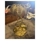 vintage brass camel under a palm tree sculpture