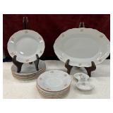 14 pc. vintage white porcelain plates featuring