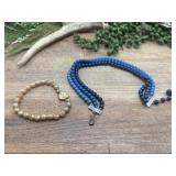This multi-strand bracelet features small blue