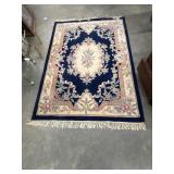A traditional Aubusson-style rug