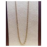 This then 12k yellow gold rope necklace features