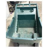 green Rubbermaid Roughneck lawn cart featuring