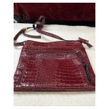 Maroon Crossbody multiple pockets purse.